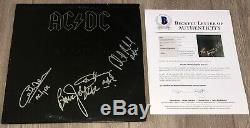 AC/DC SIGNED BACK IN BLACK VINYL RECORD ALBUM ANGUS YOUNG +3 with BECKETT BAS LOA
