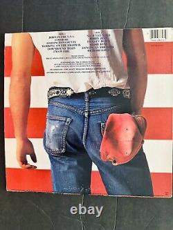 Bruce Springsteen Signed Born In The USA Album Cover With Vinyl COA IP # 10018449