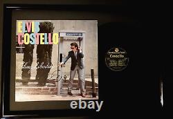 ELVIS COSTELLO signed and framed TAKING LIBERTIES album cover