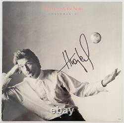 Huey Lewis signed Small World album COA exact proof autographed Vinyl Record