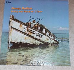 JIMMY BUFFETT HAND SIGNED'LIVING AND DYING IN 3/4 TIME' RECORD ALBUM LP withCOA