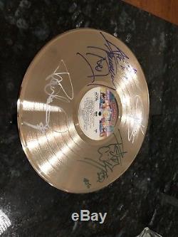 KISS Signed (Peter, Paul, Gene, and Ace) Gold Record Debut Album