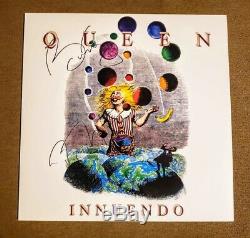 Queen Signed/Autographed Roger Taylor & Brian May Innuendo Album with Coa