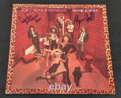 REO SPEEDWAGON signed autographed NINE LIVES LP RECORD ALBUM BECKETT (BAS)