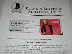 TOM PETTY Signed DAMN THE TORPEDOES LP ALBUM COVER with Beckett LOA