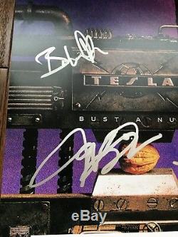 Tesla GROUP Signed Autographed BUST A NUT Album Photo PSA/DNA LOA Jeff Keith